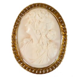 Circa 1930 White Shell Cameo Brooch in an 18k Gold Herringbone Frame