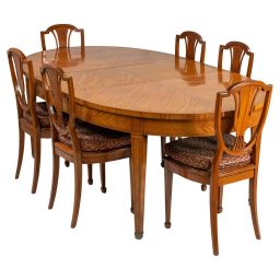 Edwardian Period English Hepplewhite-Inspired Satinwood Dining Ensemble with Oval Table and Eight Shield Back Chairs